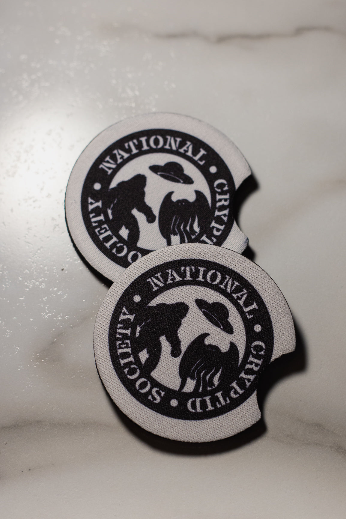 National Cryptid Society Car Coasters, set of 2